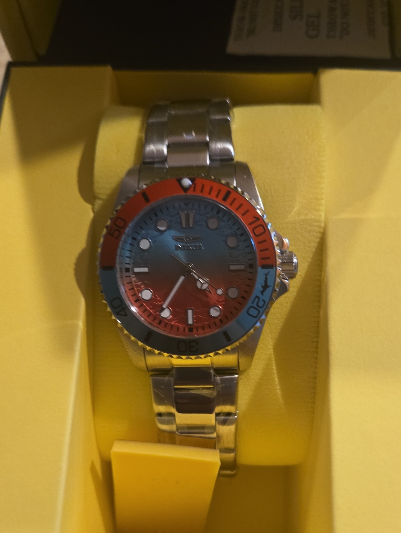 Invicta Stainless Steel Watch With Blue And Orange Dial